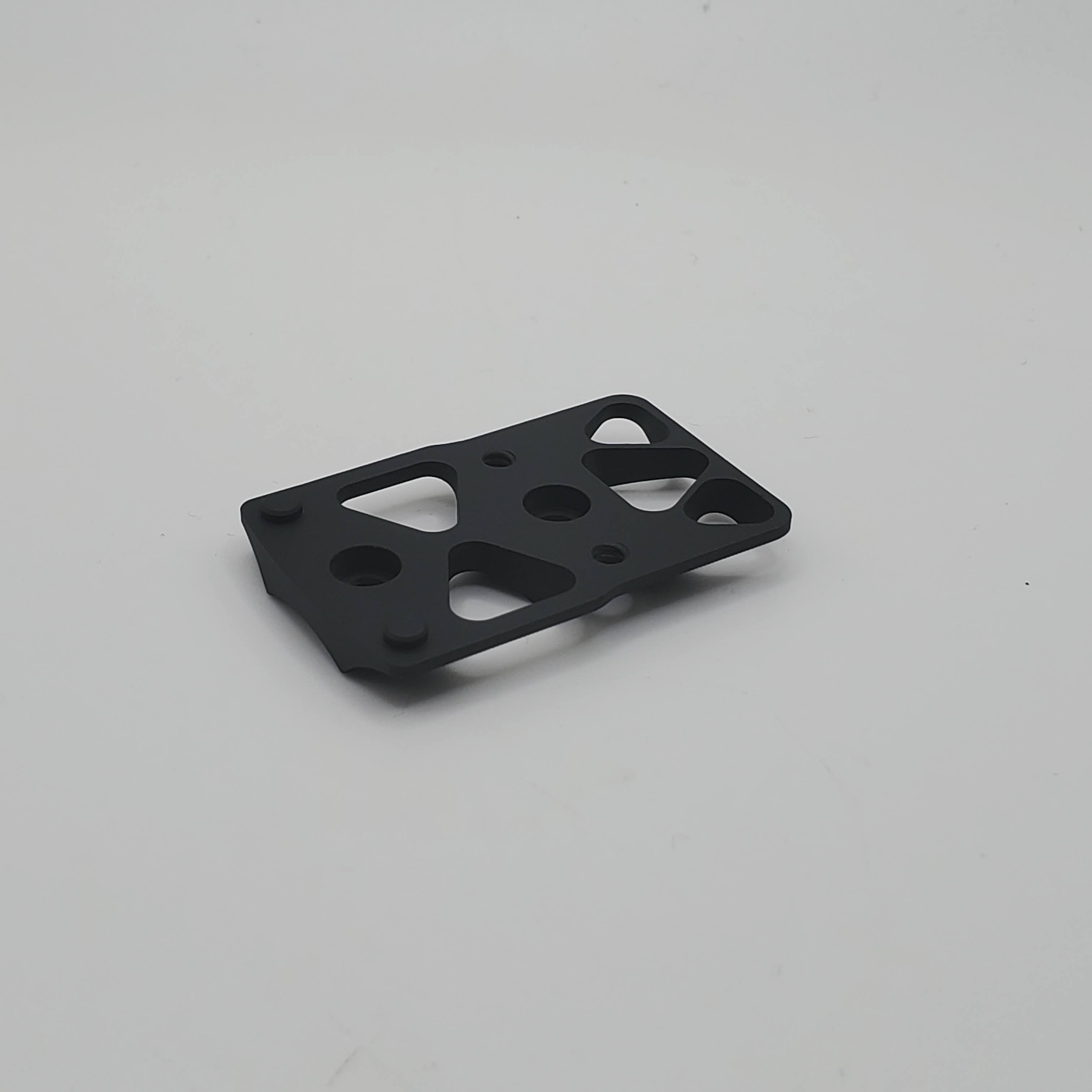 Ruger Mark IV Silencer Shop Exclusive Trijicon SRO adapter plate, designed for secure optic attachment.